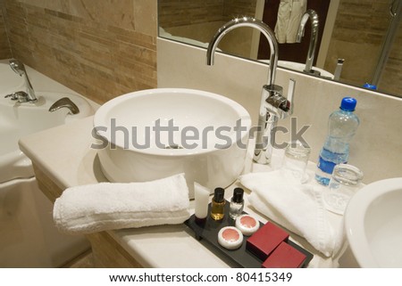 Modern Bathroom interior, marble sink and tap