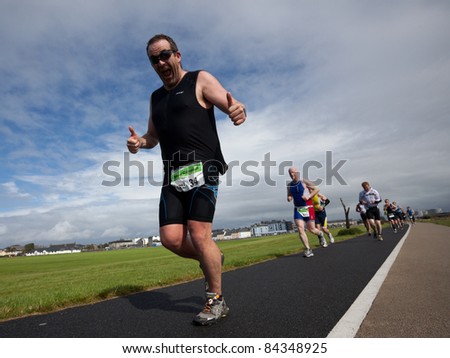 GALWAY, IRELAND - SEPT 4: Rossa O\'Donnell (34) competes at first Edition of Galway Iron Man  Triathlon on September 4, 2011 in Galway, Ireland