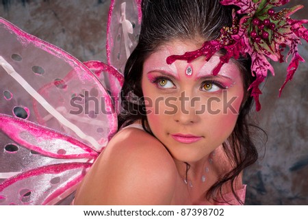 portrait of a woman in the makeup Pink Fairy