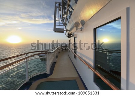 View of sunset from deck of ocean cruise ship