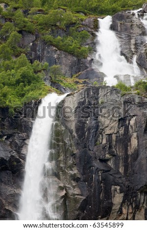 Mountain landscape with waterfall near Jostedal glacier, Norway - Scandinavia