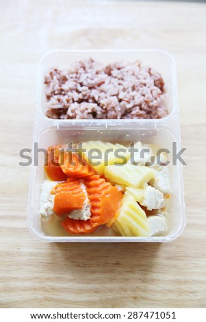 Clean food steam potato chicken carrot with rice in bento