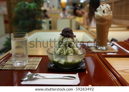 Traditional Japanese Dessert , A Bowl of Red Bean Sweet with sweet green tea ice Snow cone japanese style  on food park