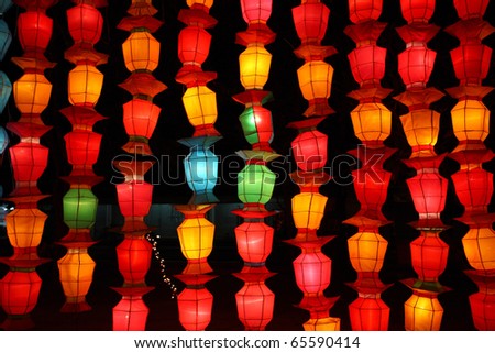 colorful yellow red green pink lantern with night scene