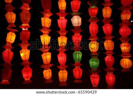 colorful yellow red green pink lantern with night scene