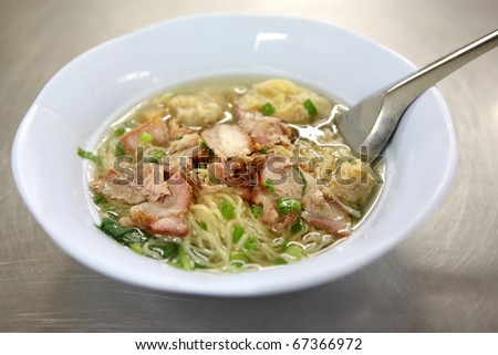 Chinese food : noodle dumpling with parsley and roasted red pork