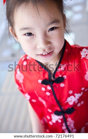cute lovely sweet asian kid girl with smiling face in home background