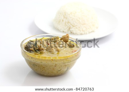 Thai food beef curry with rice isolated in white background