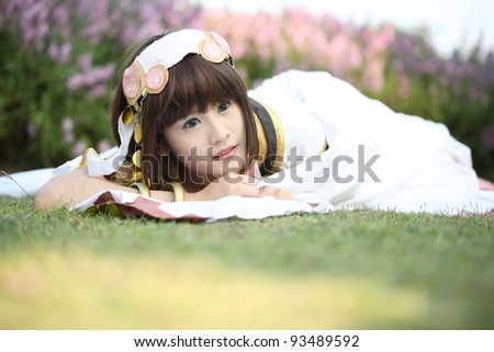 Cute Asian cosplay girl sleep with pink flower