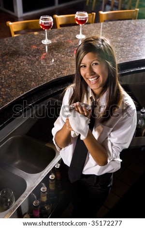 Cheerful pretty female bartender