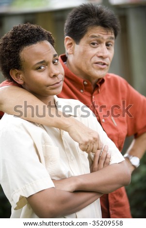 African American teenage boy with Hispanic father