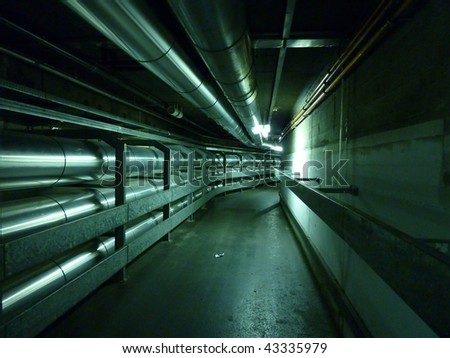 istock - Comment réussir à se faire accepter chez Istock ? Stock-photo-underground-tunnel-with-metallic-pipes-43335979