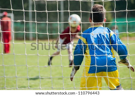 Soccer goalie in action Soccer goalie in action
