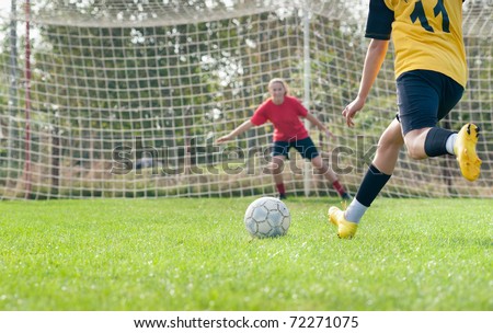 kicking and  Defending in soccer