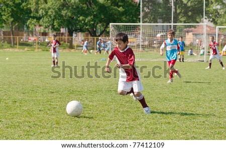 Boy Playing Sports