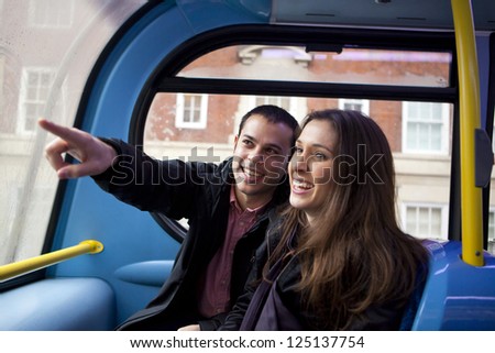 Couple of tourist travelling on a bus