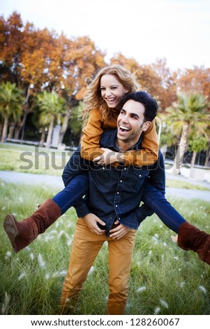 Young Couple In The Countryside In Autumn.
