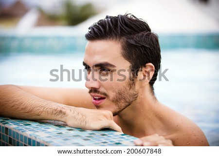 Young man relaxing on a luxury rooftop