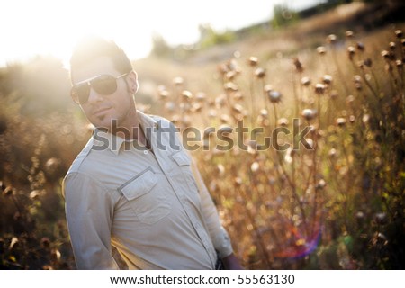 Man in country in summer day