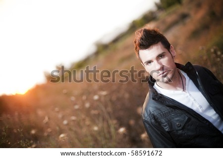 Man in country in summer day