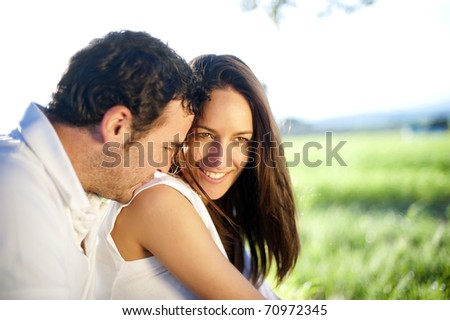 Young happy couple in nature