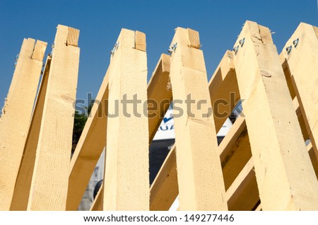 Stack of Building Lumber at Construction Site,ready for montage