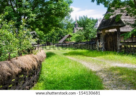 Old vilage in Maramures, Romania. Romanian traditional architectural style, life in the countryside.