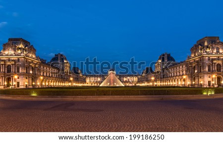 Paris, France - June 7th, 2014: The Louvre museum, Paris, at twilight, one of the major tourist attractions in France and in Europe