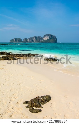 Rocks on the beach in Tropical sea at Bamboo Island Krabi Province Southeast Asia Thailand.