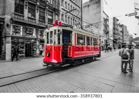 Trams passing through Istiklal street. Selective focus. Slow time shutter speed for the panning effect