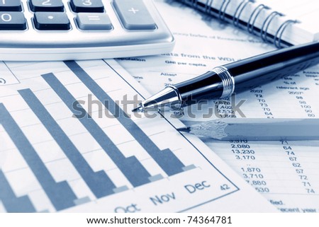 Background of business graph and stationary pen