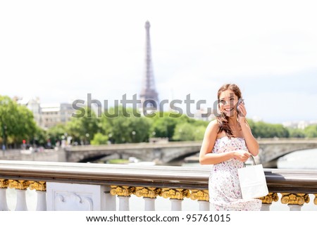 http://image.shutterstock.com/display_pic_with_logo/463936/95761015/stock-photo-paris-woman-talking-on-mobile-phone-smart-phone-in-paris-france-with-eiffel-tower-in-background-95761015.jpg