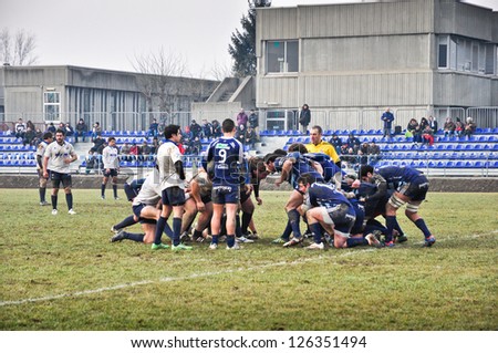 TURIN - JANUARY 27: Unidentified players before the engage in scrum during the rugby match between Cus Torino and Amatori Parma, on January 27, 2013 Turin, Italy.