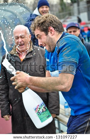 TURIN - MARCH 9: Celebration of the Man of the Match, Andrea Merlino, player of Cus Torino team, after the second Derby della Mole between Cus Torino and Rugby Torino, on March 9, 2013 Turin, Italy.
