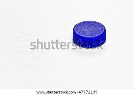 Blue plastic cap. Shallow dof.