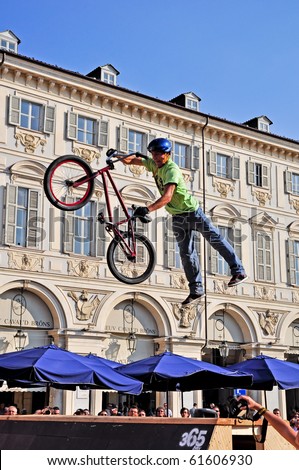 TURIN - SEPTEMBER 12: BMX rider jumps in St. Charles square during the event Turin Street Style. September 12, 2010 (Turin), Italy.