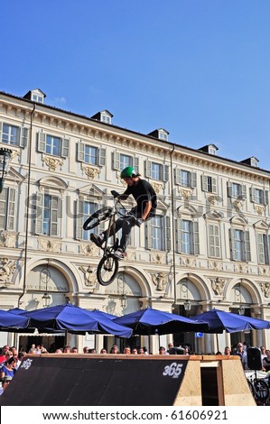 TURIN - SEPTEMBER 12: BMX rider jumps in St. Charles square during the event Turin Street Style. September 12, 2010 (Turin), Italy.