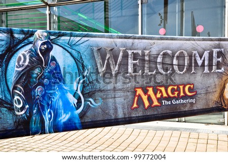 TURIN - APRIL 1: The welcome poster of Magic The Gathering at the main gate of the site of the tournament Grand Prix Turin on April 1, 2012 Turin, Italy.