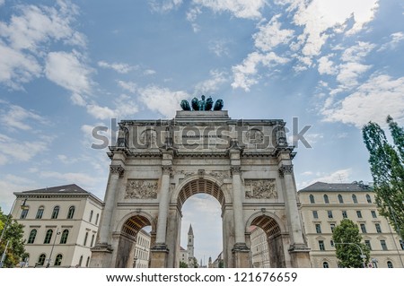 The Victory Gate (Siegestor), a three-arched triumphal arch crowned with a statue of Bavaria with a lion-quadriga in Munich, Germany