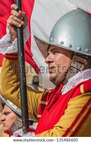 BIRGU - NOV 04: In Guardia re-enactment portraying the inspection of the fort and its garrison by the Grand Bailiff of the Order of the Knights of St. John on November 04, 2012 in Birgu, Malta.