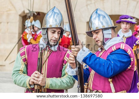 BIRGU - NOV 04: In Guardia re-enactment portraying the inspection of the fort and its garrison by the Grand Bailiff of the Order of the Knights of St. John on November 04, 2012 in Birgu, Malta.