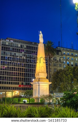 BUENOS AIRES, ARGENTINA - MAR 29: The Piramide de Mayo (May Pyramid), on Plaza de Mayo square, the oldest national monument in the city on Mar 29, 2013 in Buenos Aires, Argentina.