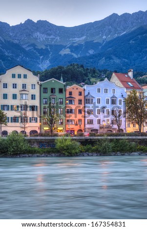 INNSBRUCK, AUSTRIA - AUG 15: Inn river, a 517 kilometres long tributary of the Danube on its way through the capital of Tyrol region on Aug 15, 2013 in Innsbruck, Austria.