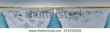Sunset in Salinas Grandes salt flats water pool in Jujuy province, northern Argentina.