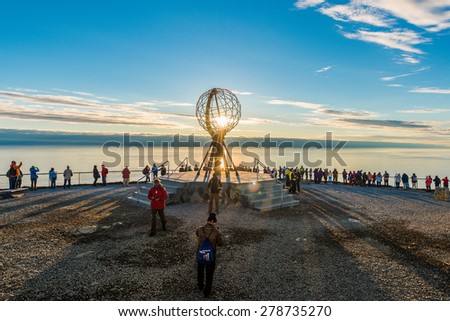 NORTH CAPE, NORWAY - JUNE 30, 2014: People visiting North Cape (Nordkapp), on the northern coast of the island of MagerÃ?Â¸ya in Finnmark, Northern Norway.