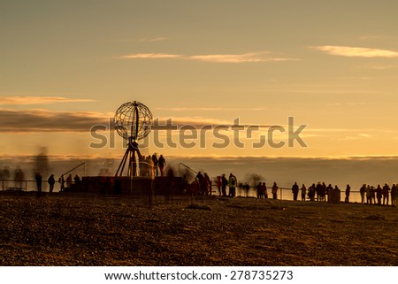 NORTH CAPE, NORWAY - JUNE 30, 2014: People visiting North Cape (Nordkapp), on the northern coast of the island of MagerÃ?Â¸ya in Finnmark, Northern Norway.