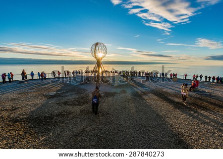 NORTH CAPE, NORWAY - JUNE 30, 2014: People visiting North Cape (Nordkapp), on the northern coast of the island of Mageroya in Finnmark, Northern Norway.
