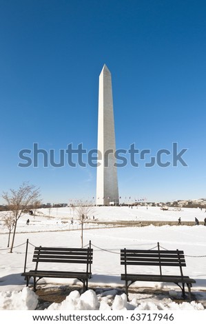 The Washington Monument after a snow blizzard at the Mall in DC, USA