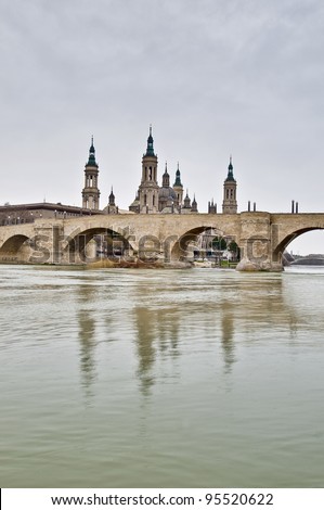 Stone Bridge across the Ebro River as seen from the Pillar Bridge at Zaragoza, Spain