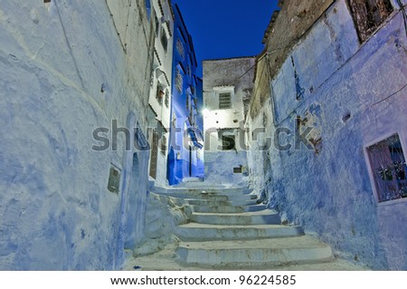 Night on blue shaded city streets of Chefchaouen, Morocco
